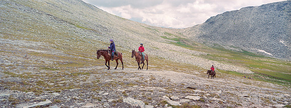 Riders at a mountain pass, Eastern Kazakhstan