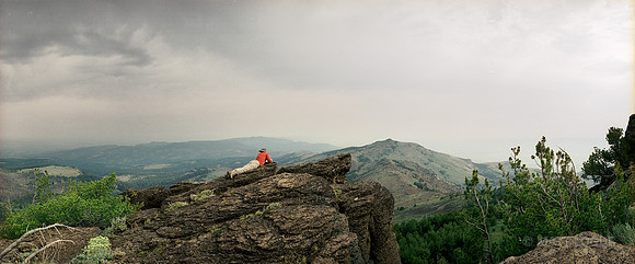 A woman hiker relaxes on the hike to Warren Mountain, Modoc National Forest, CA